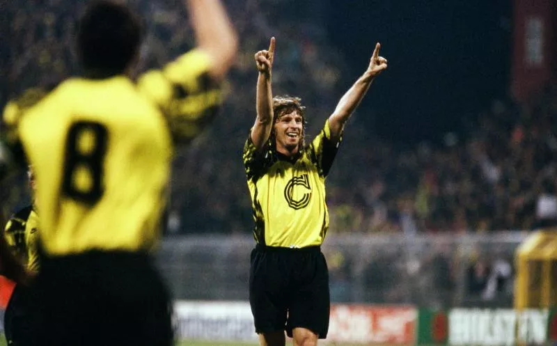 firo: 06.04.1993 football: football: archive photos, archive photo, archive pictures, archive, Europa League. UEFA Cup season 1992/1993, 92/93, semifinals, first leg BVB, Borussia Dortmund - AJ Auxerre 2:0 Michael Schulz, half figure, jubilation, cheers - Photo by Icon sport   - Photo by Icon Sport