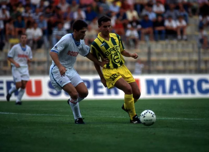 Maxence Flachez from Olympique Lyonnais and Nicolas Ouedec from Fc Nantes during the match between Nantes and Lyon on July 29th, 1994. Photo : Jean Michel Bancet / Icon Sport   - Photo by Icon Sport