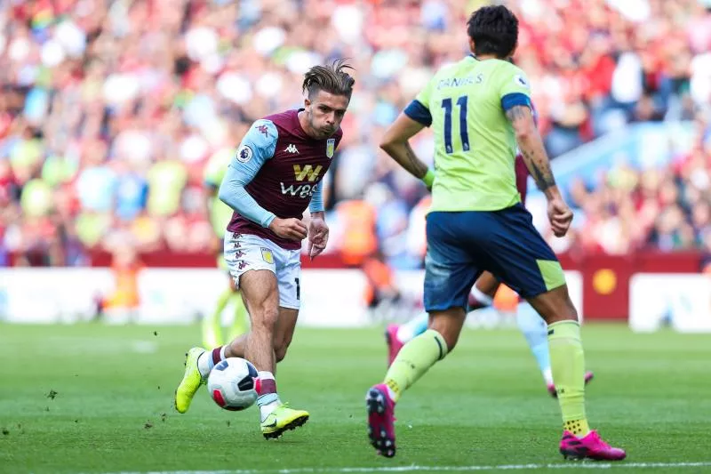 Jack Grealish of Aston Villa knocks the ball past Charlie Daniels of Bournemouth  during the Premier League match at Villa Park, Birmingham. Picture date: 17th August 2019. Picture credit should read: James Wilson/Spi/Icon Sport   - Photo by Icon Sport