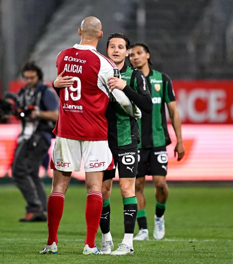 Ludovic AJORQUE of Brest and Florian THAUVIN of Lens during the Ligue 1 McDonald's match between Brest and Lens at Stade Francis Le Ble on April 24, 2026 in Brest, France. (Photo by Anthony Bibard/FEP/Icon Sport)  - Photo by Icon Sport